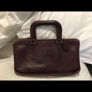 Vintage Coach- has been used, shows “love”